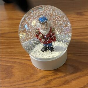 Festive Santa Snow Globe with Blue Hat